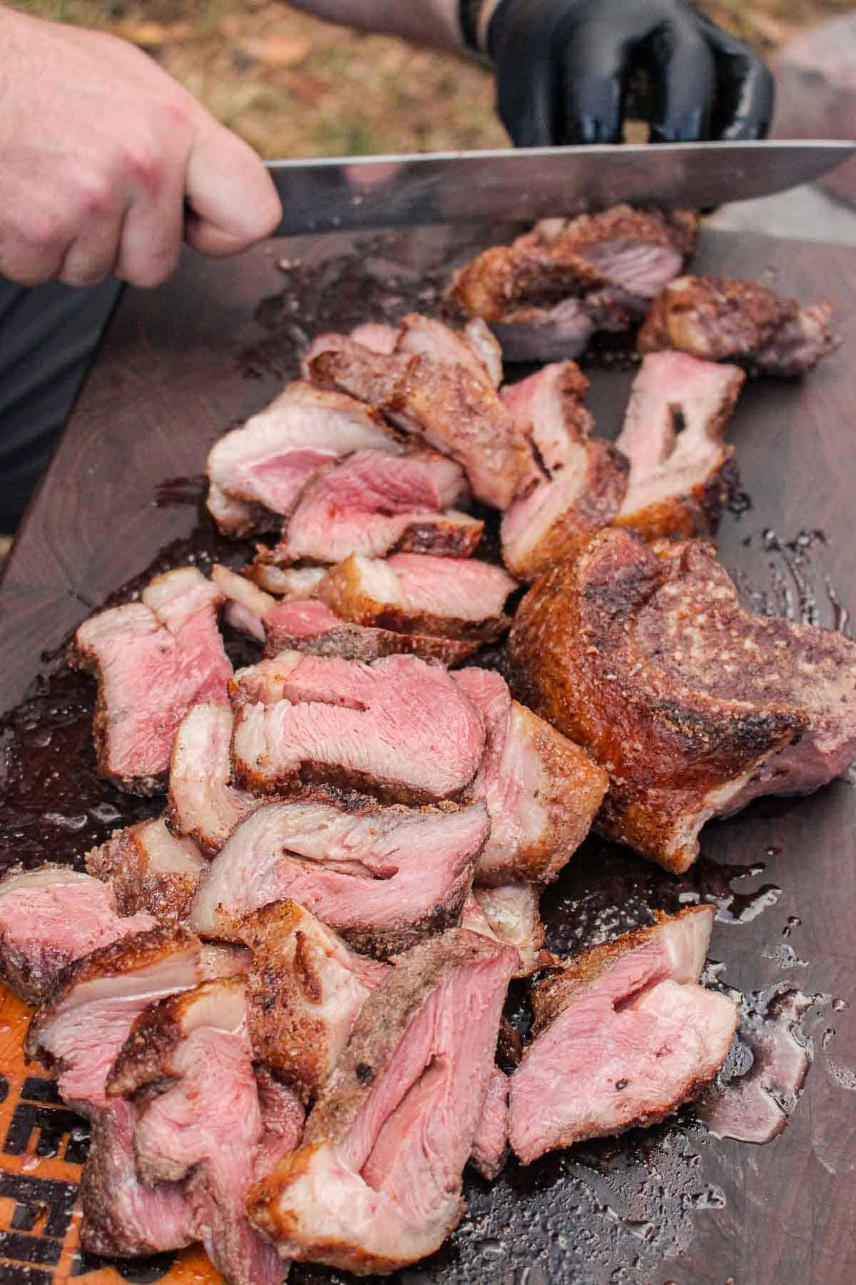 A shot of the sliced picanha before topping with the Chimichurri.