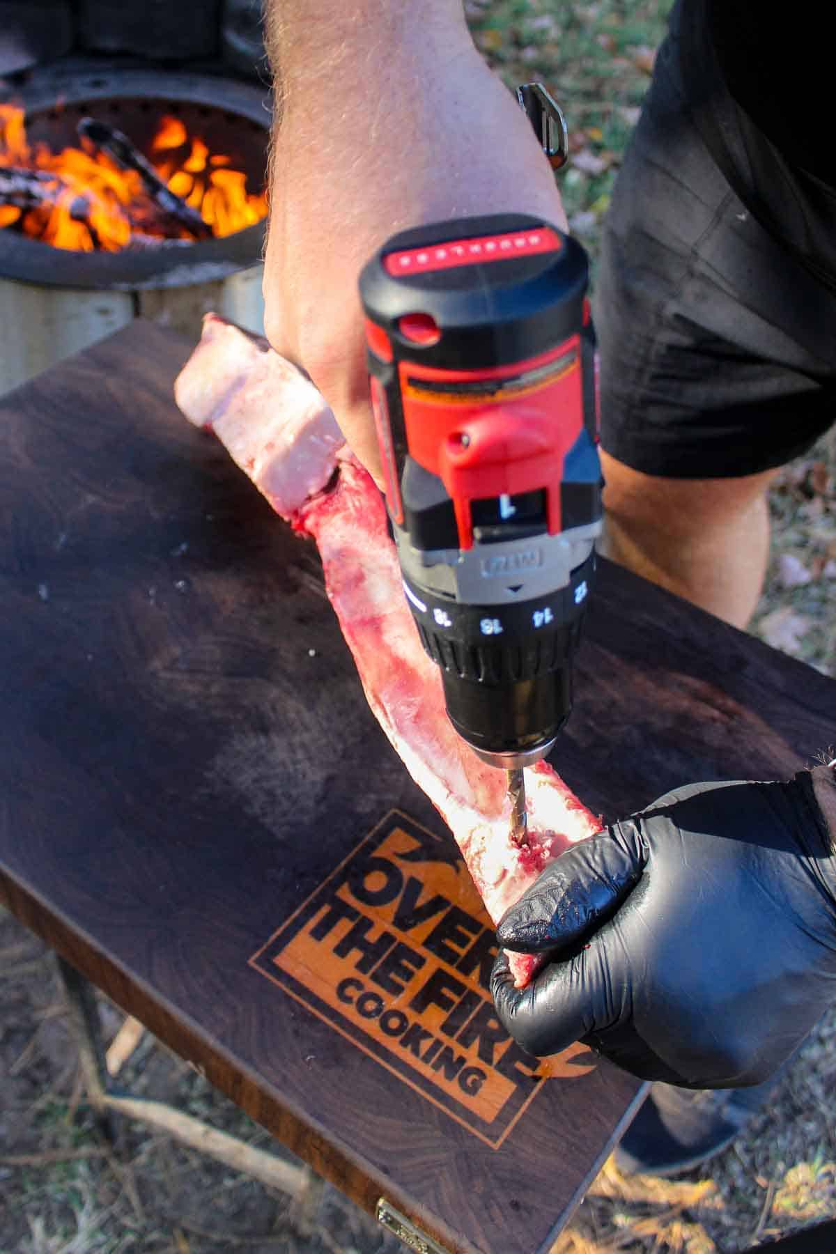 Drilling a hole in the tomahawk.