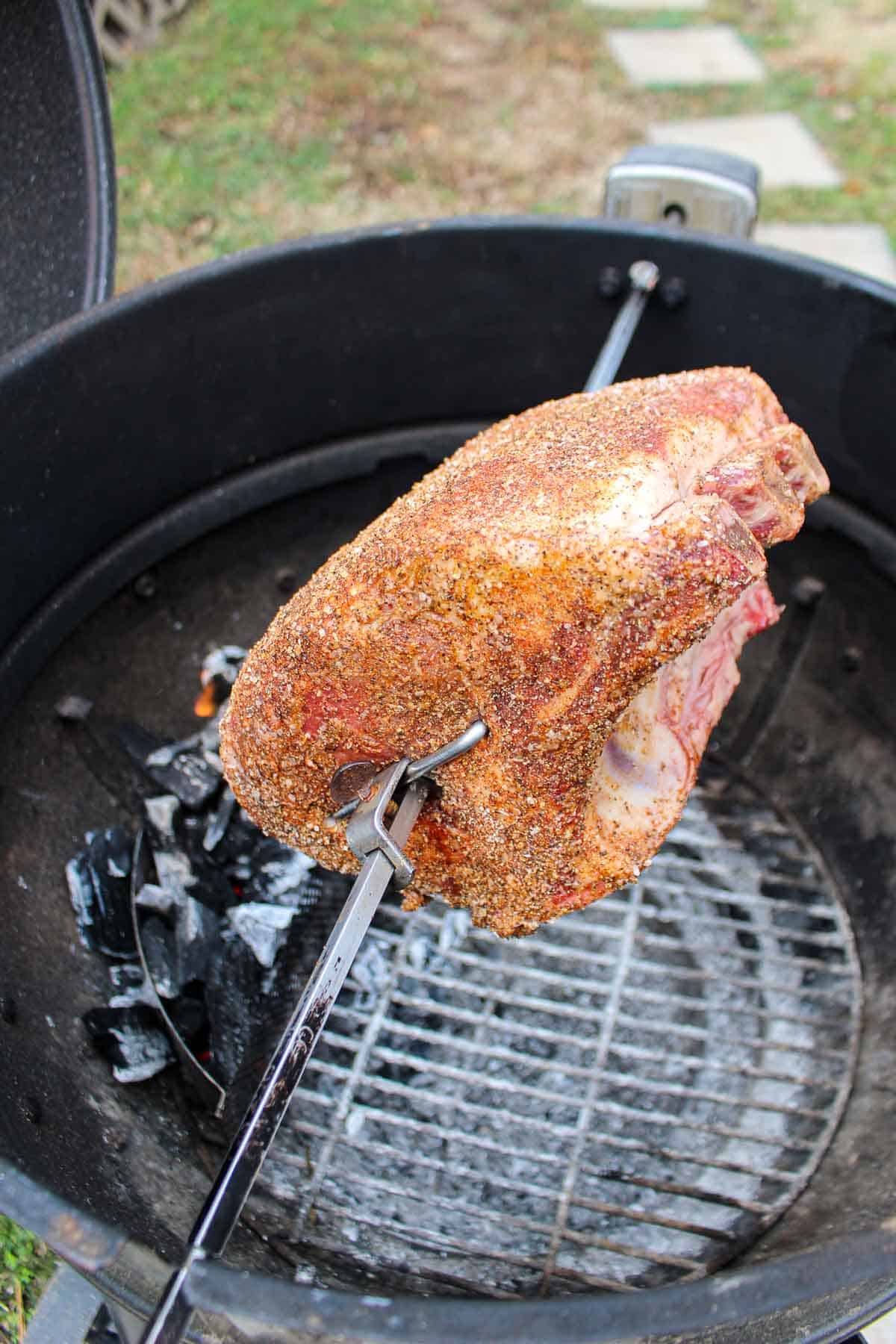 Adding the Rotisserie Prime Rib to the Grill