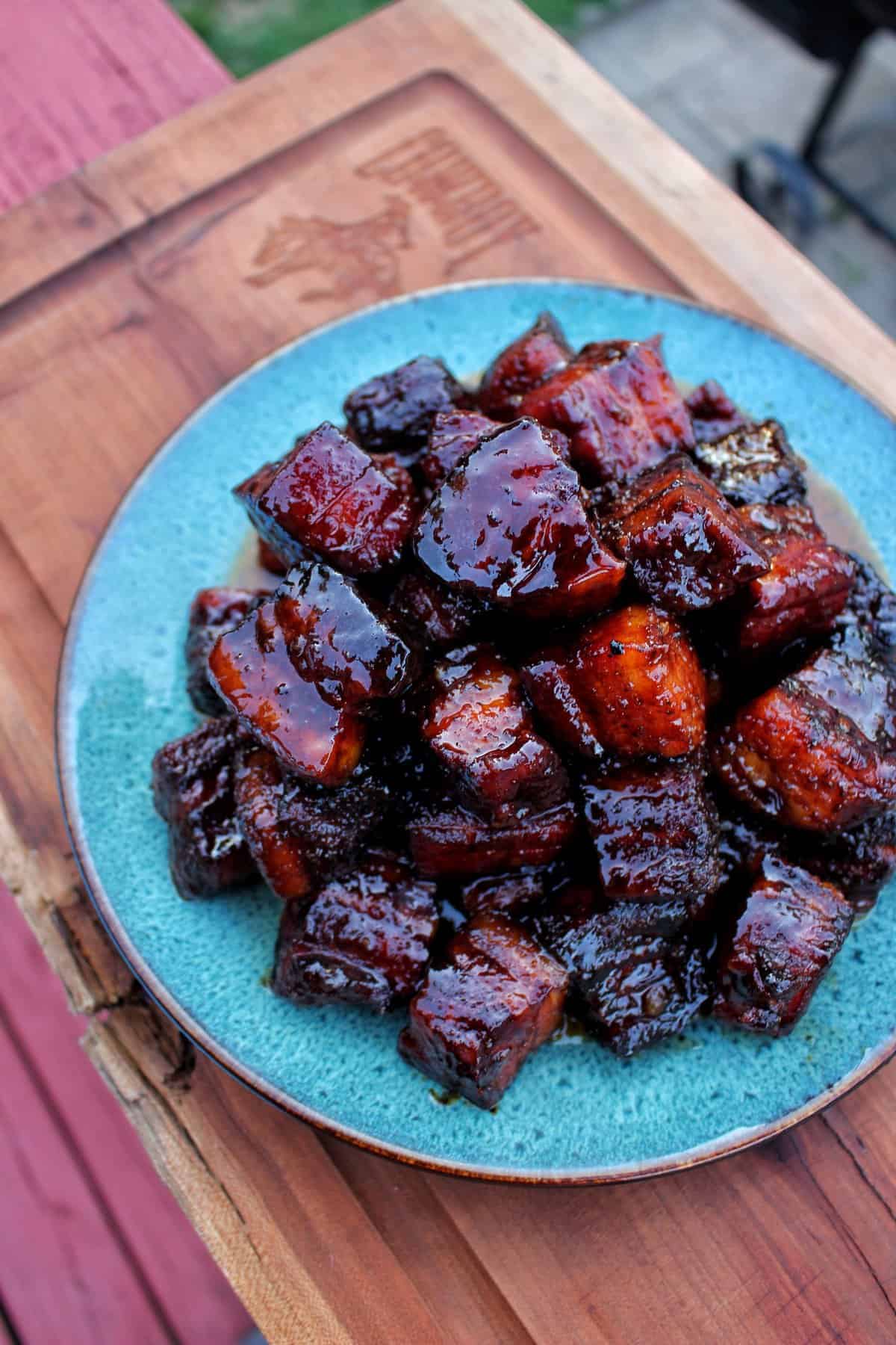 A serving platter full of Maple Bourbon Pork Belly Burnt Ends.