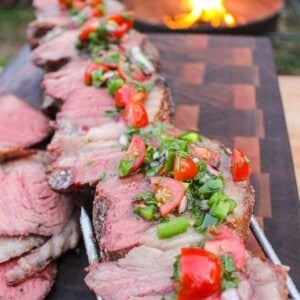 Rotisserie Picanha with Parmesan Crust sliced and served.