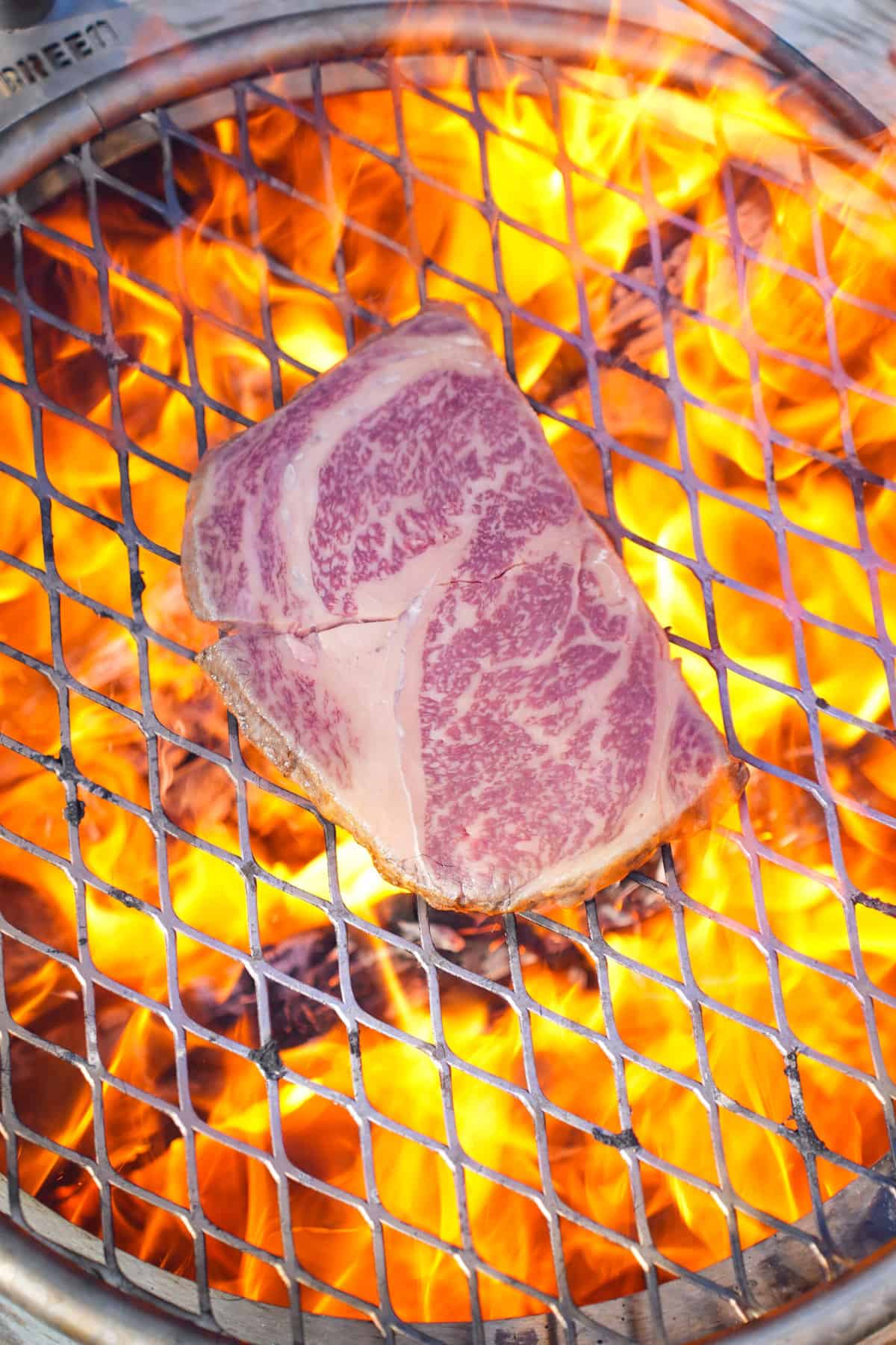 Searing the wagyu over high heat.