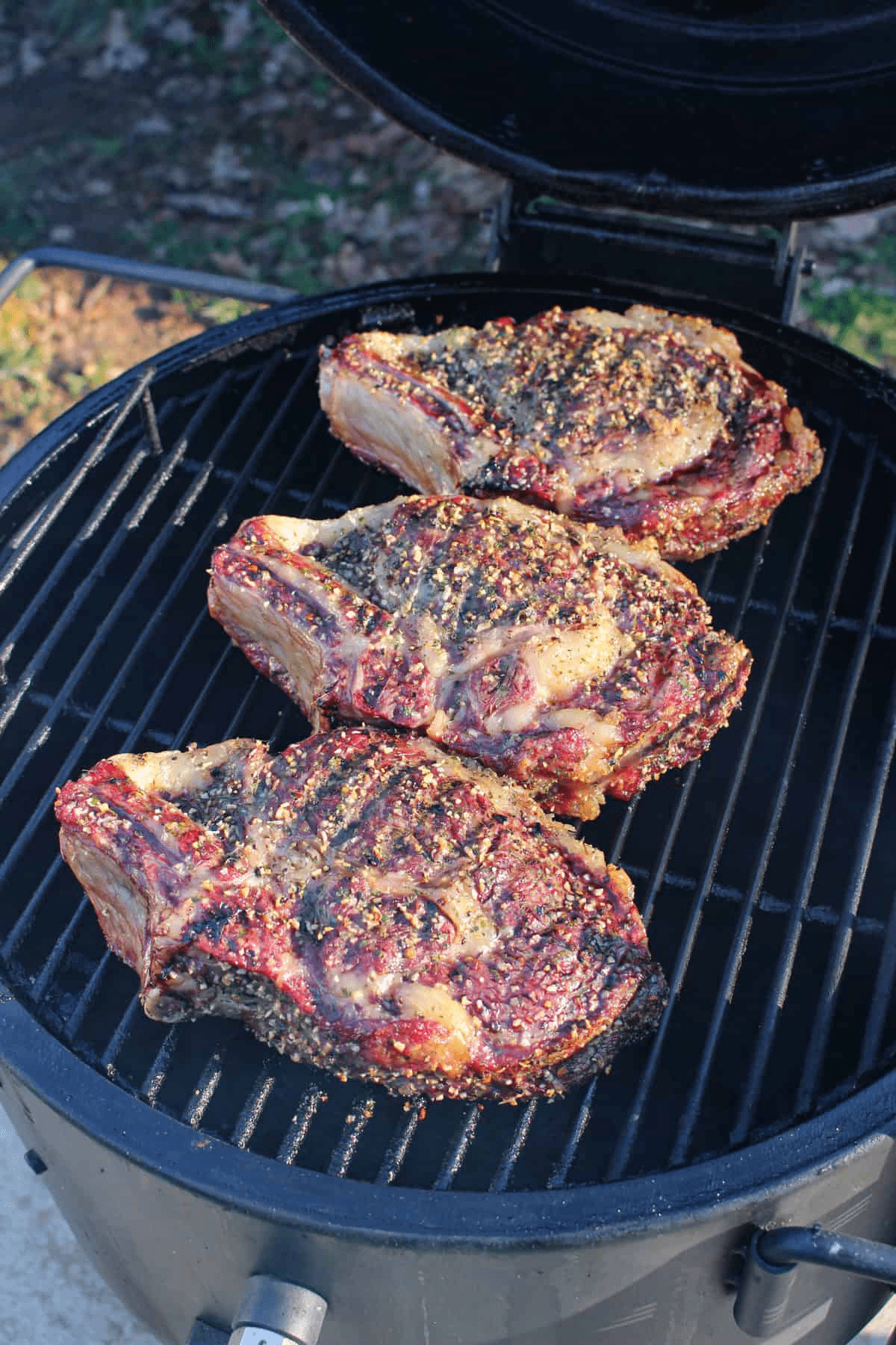 Large cut ribeyes after being smoked and ready for its sear.