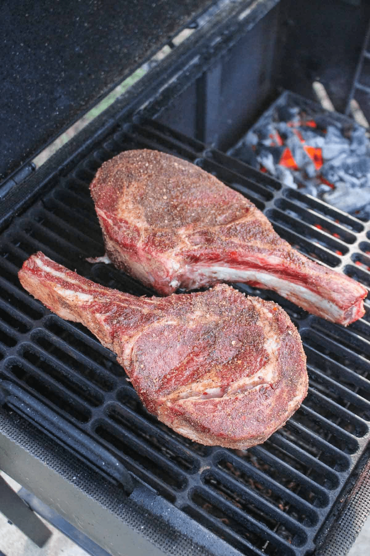 Grilled ribeyes on the smoker set up for indirect cooking.