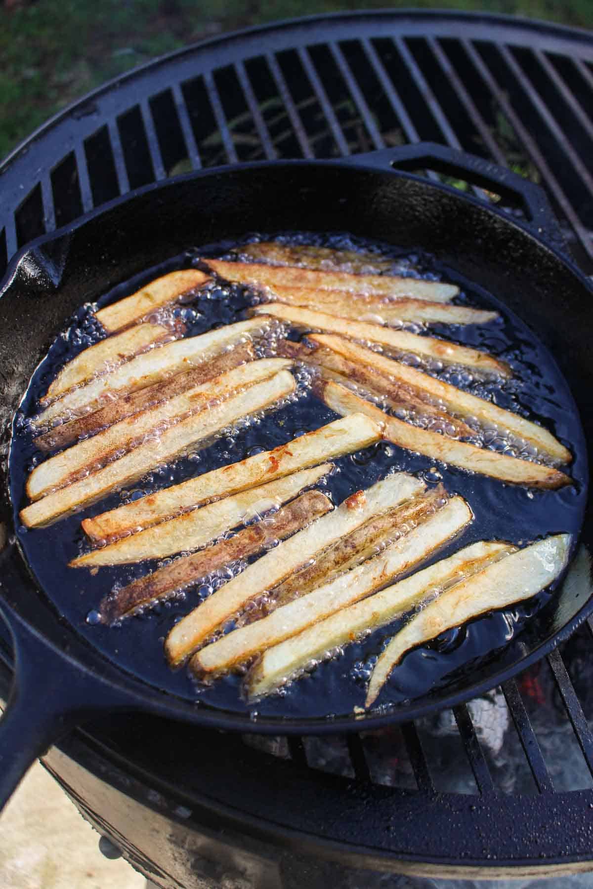 Frying fries as a side dish.