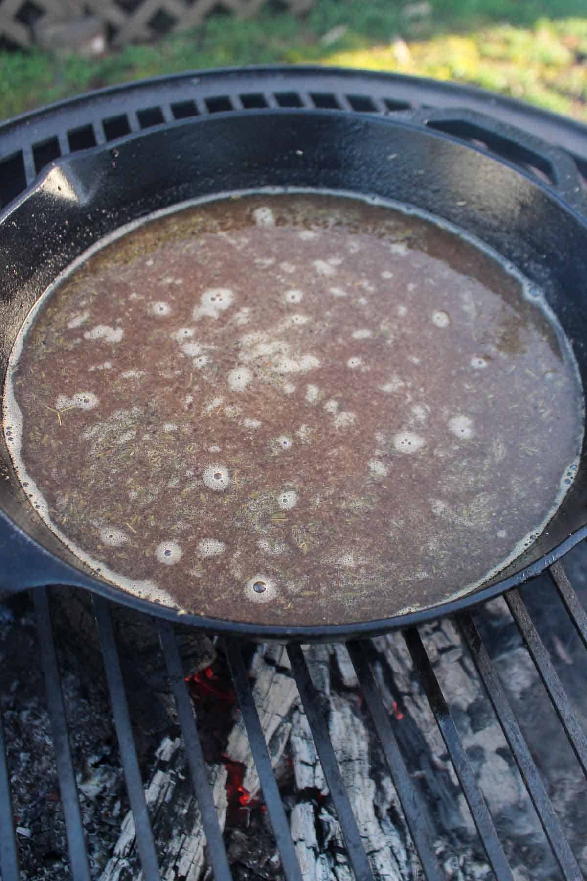 The Au Jus as it simmers over the fire.