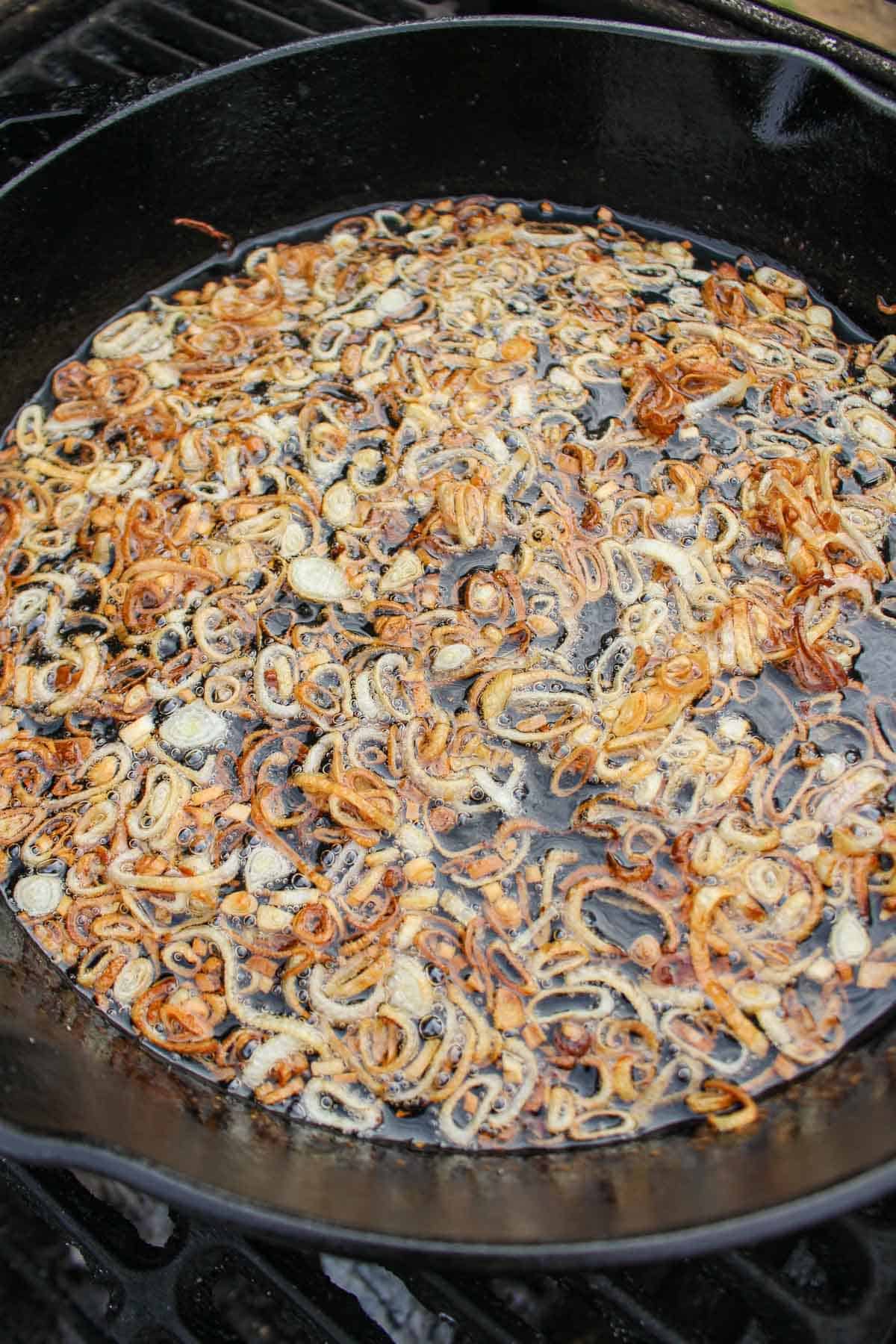 The shallots as they finish frying.