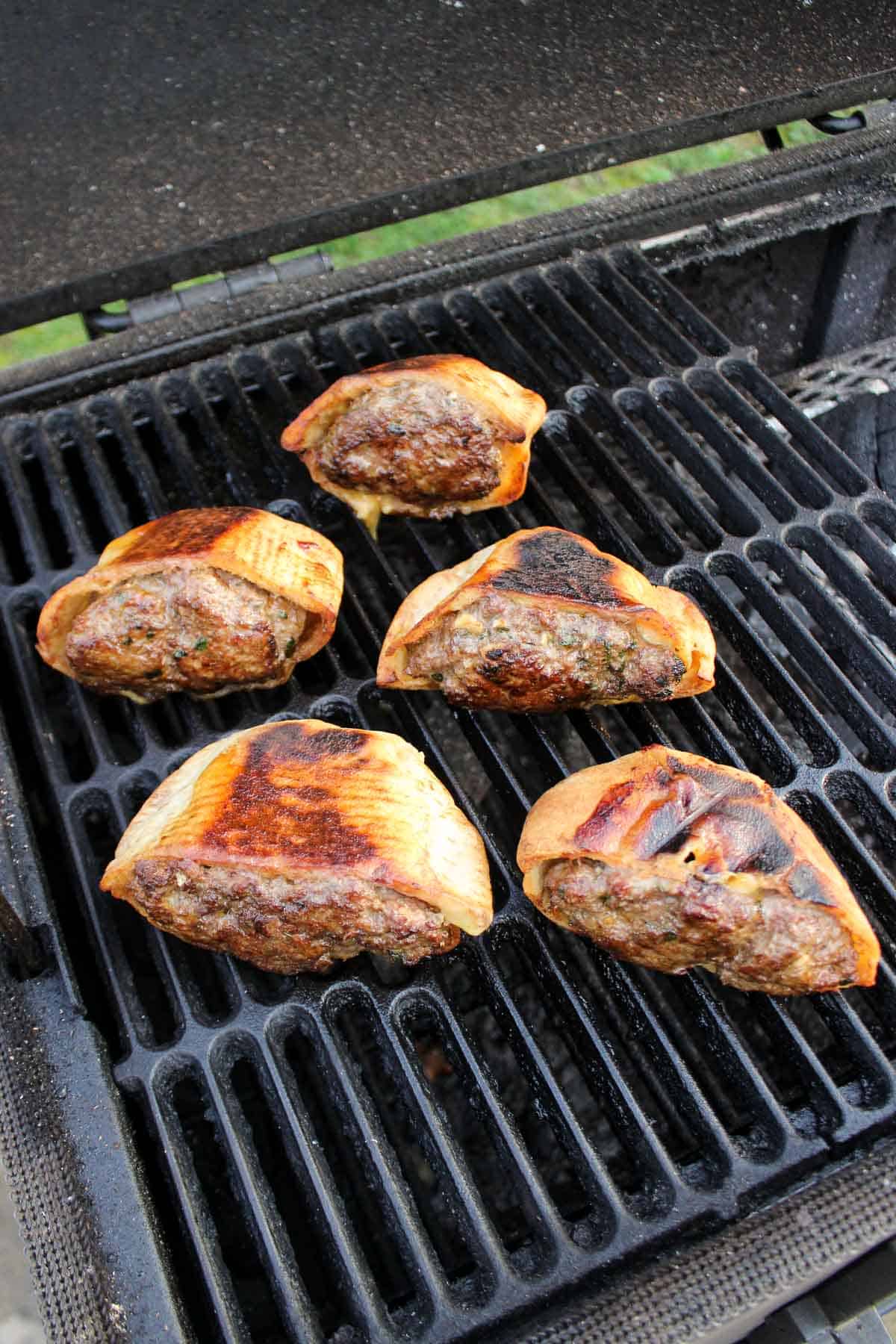 The pita pockets set on the side of the grill so they can cook indirectly.