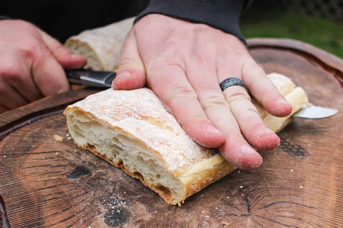 Slicing the bread for the sandwich.