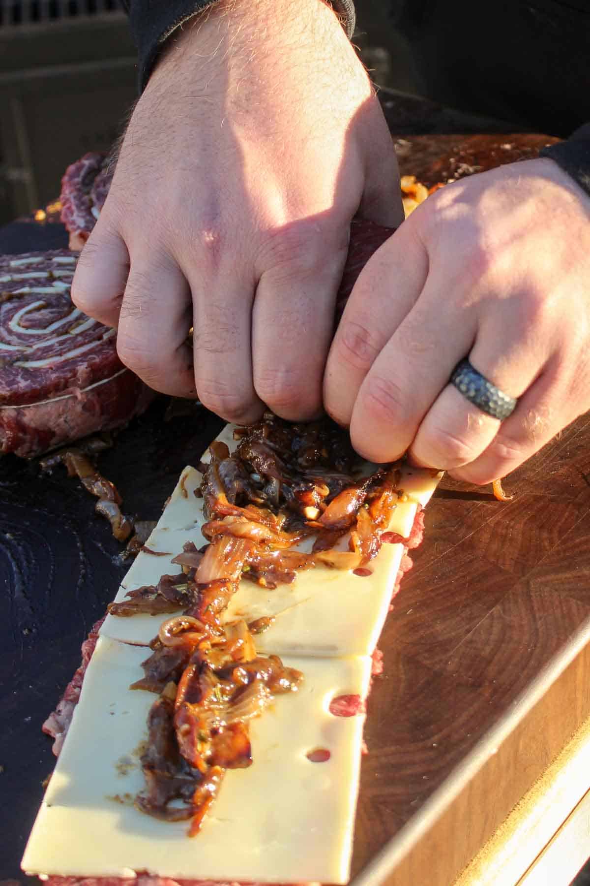 Rolling up the skirt steaks.