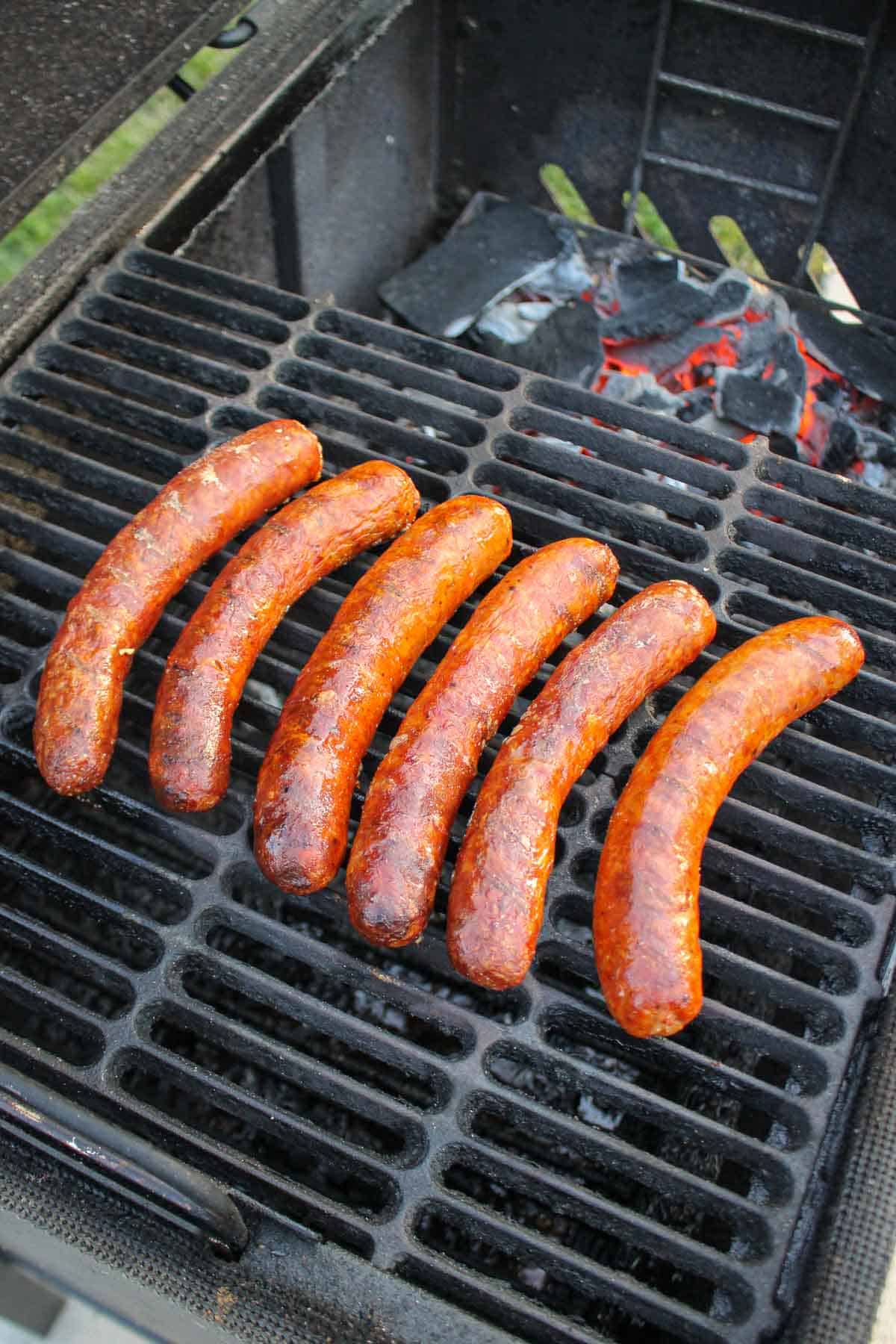 Cooking up the chorizo hot dogs.