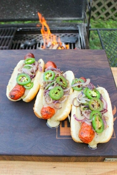 Three Chorizo Hot Dogs with Baconnaise assembled so that they can be served.