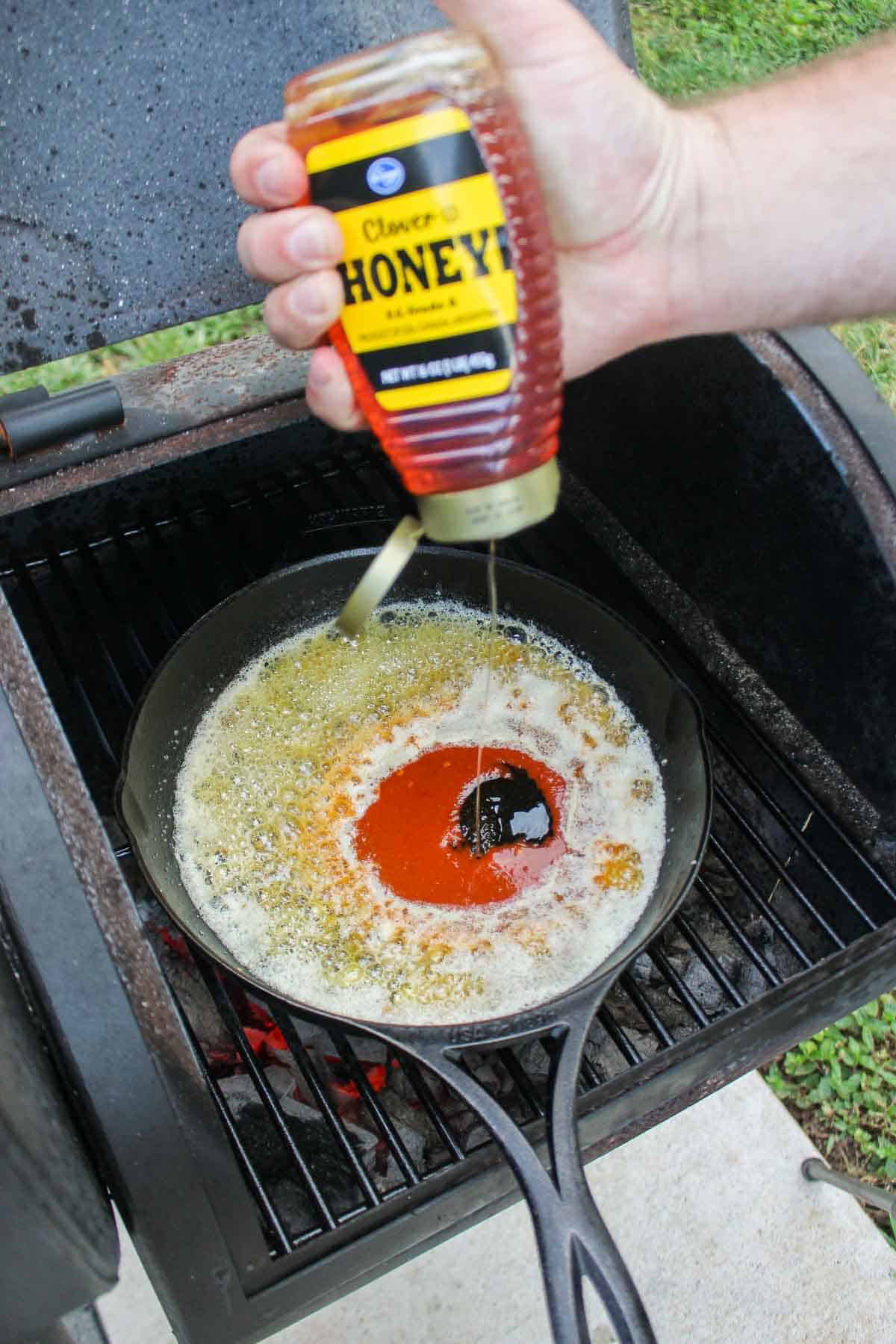 Mixing together the hot honey garlic sauce.