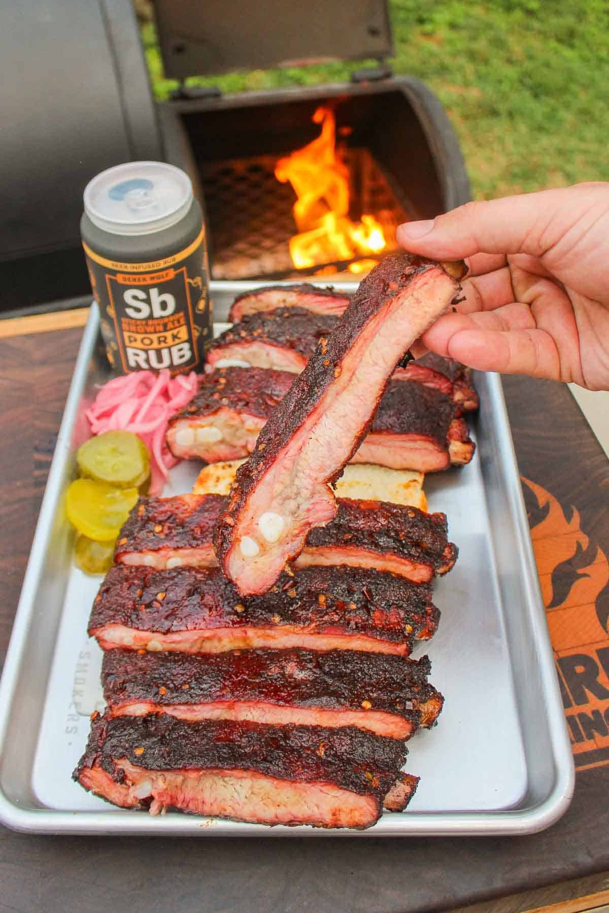 Smoked Ribs with Bourbon Mop Sauce sliced and served.