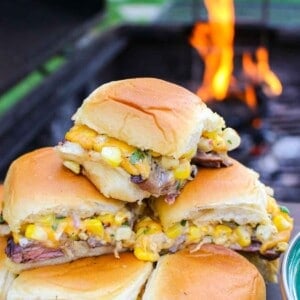 A close up shot of the Grilled Steak Elote Sliders so you can see the filling.