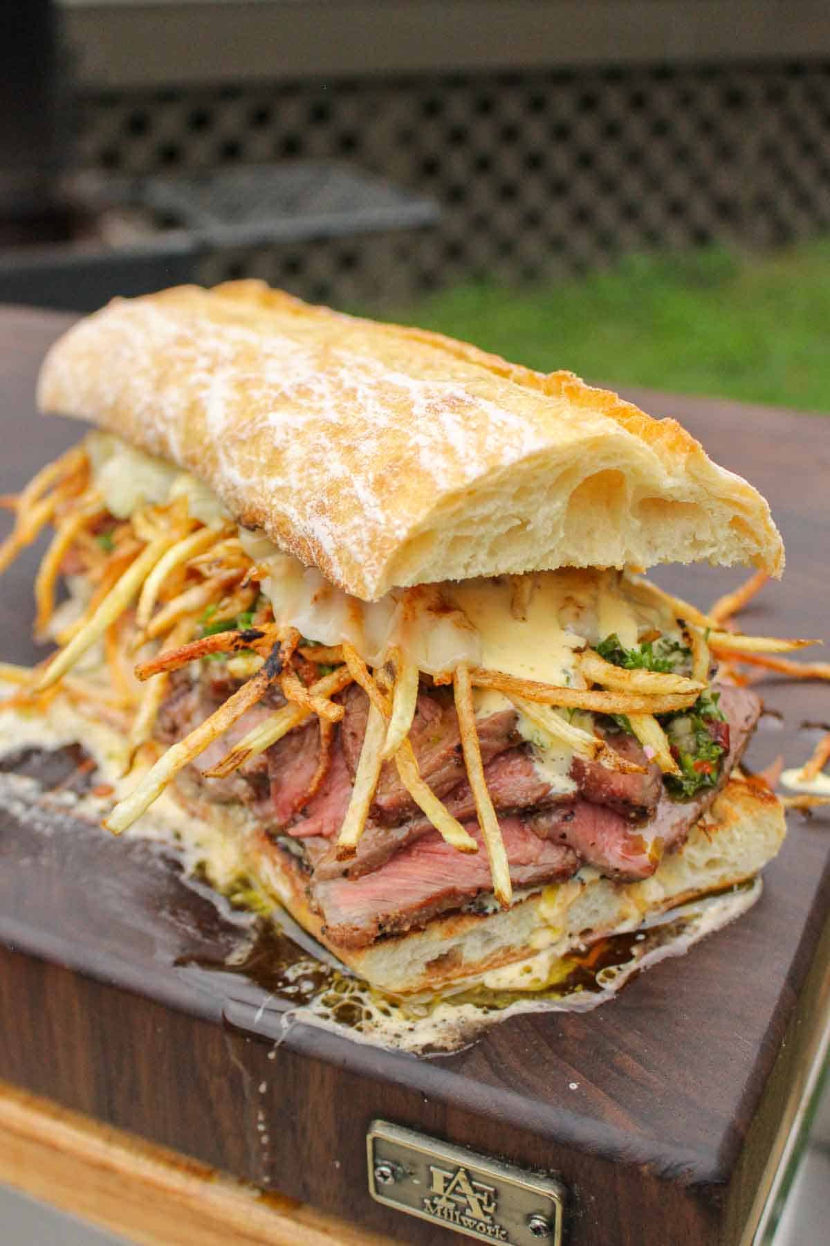The steak frites sandwich prepared and ready to serve.