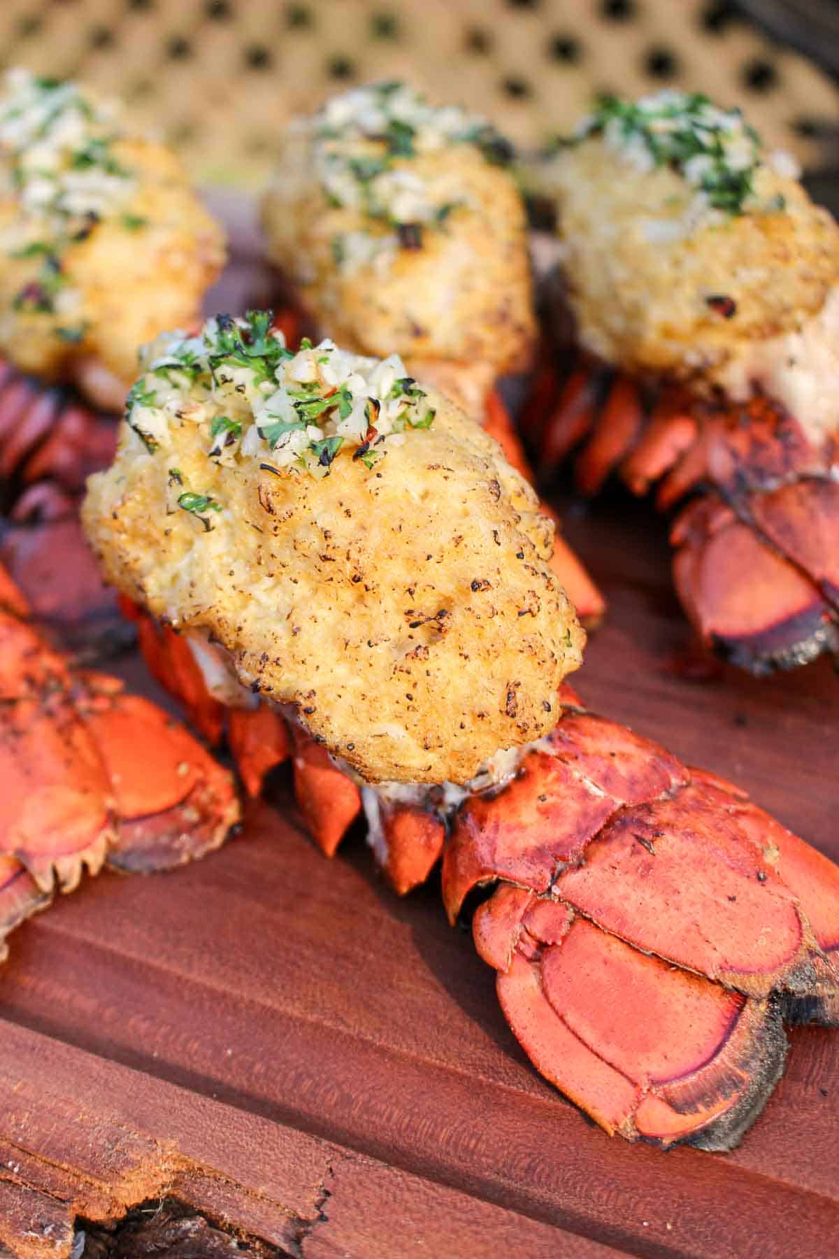 A close up shot of a finished stuffed lobster tail.