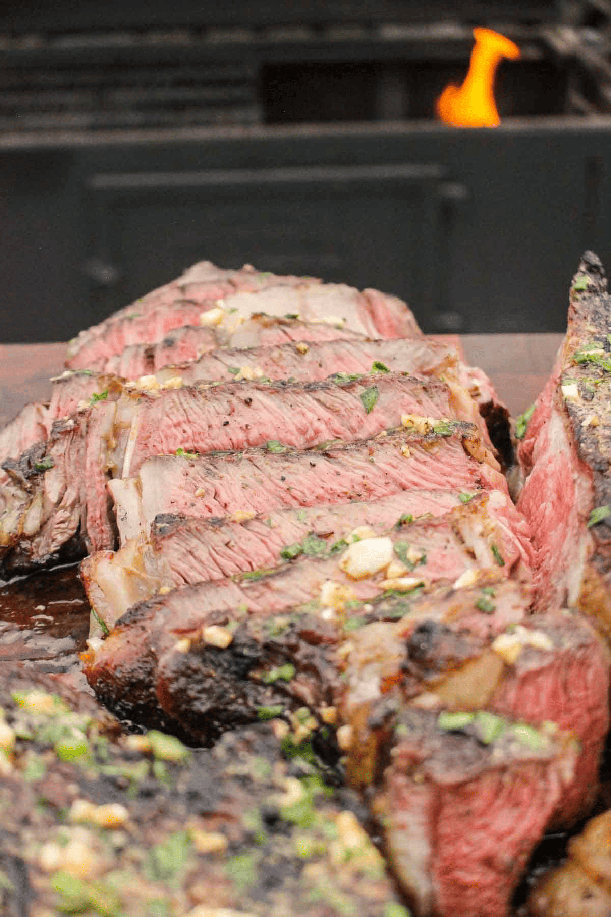 A sliced ribeye so you can see the perfectly cooked center.