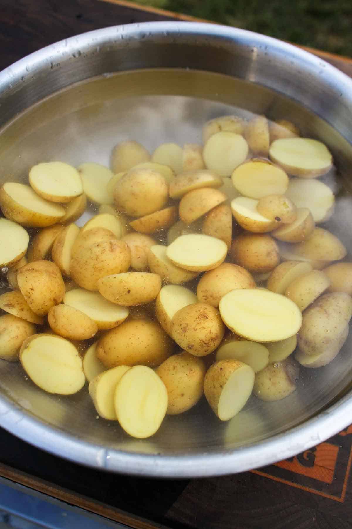 The soaking the potatoes, ready to be parboiled. 