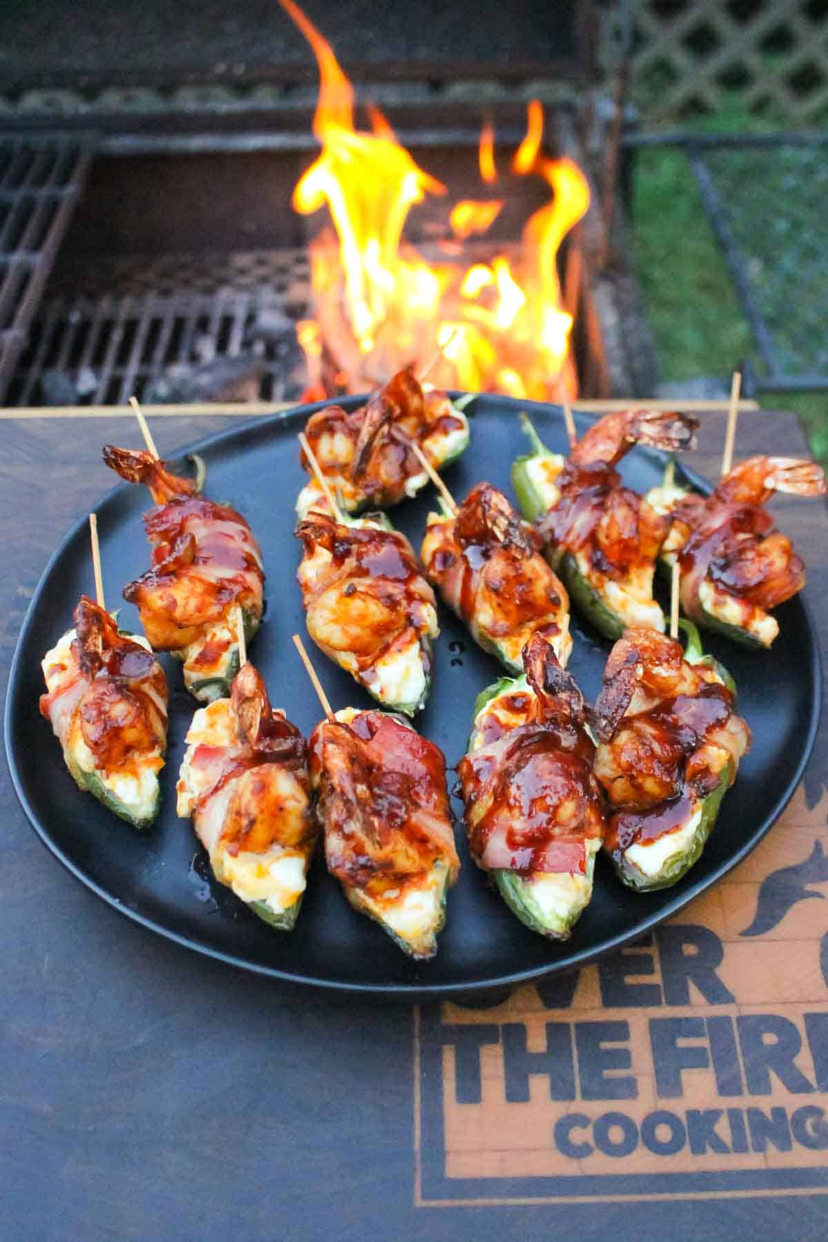 BBQ Jalapeño Poppers cooked, glazed and served!