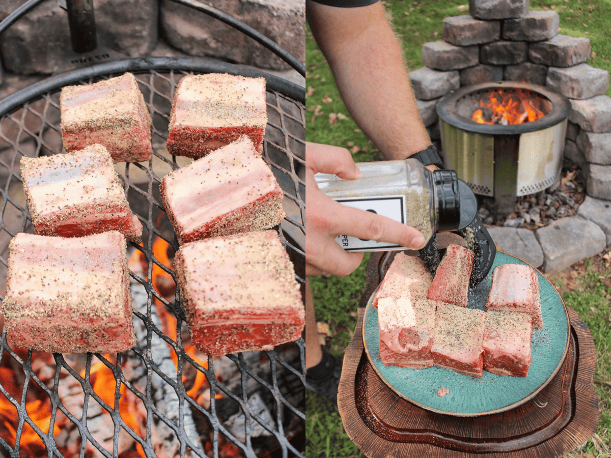 This image shows the beef ribs getting seasoned by Derek Wolf. 