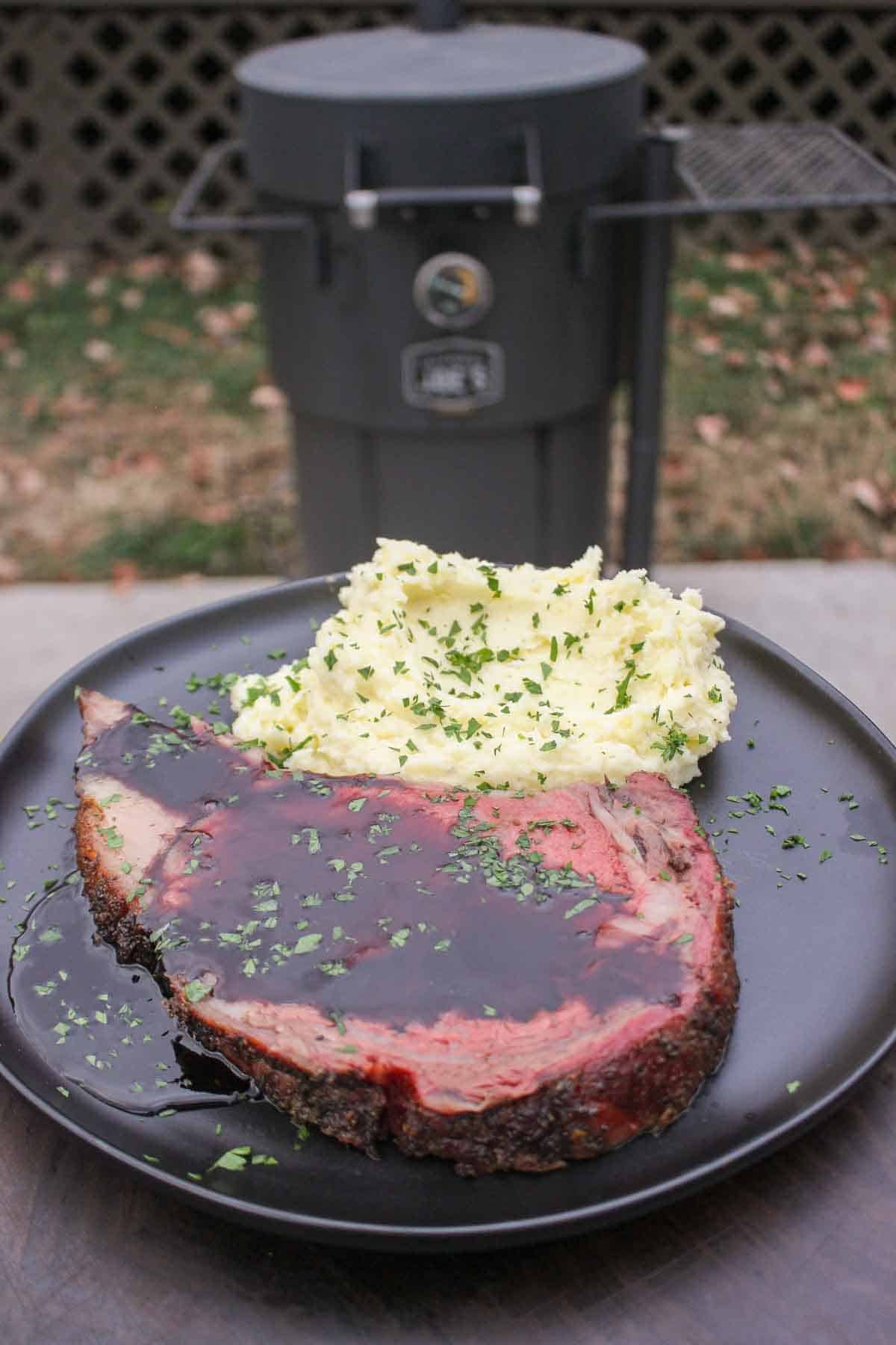 Prime rib with a red wine sauce and cheesy mashed potatoes. 