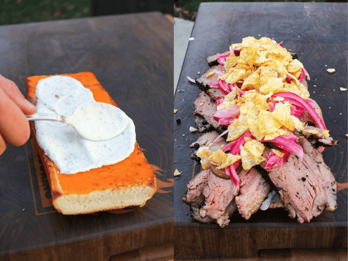 The cilantro sauce is smeared on the bread before the sliced steak, pickled onions, and crumbled potato chips are added. 