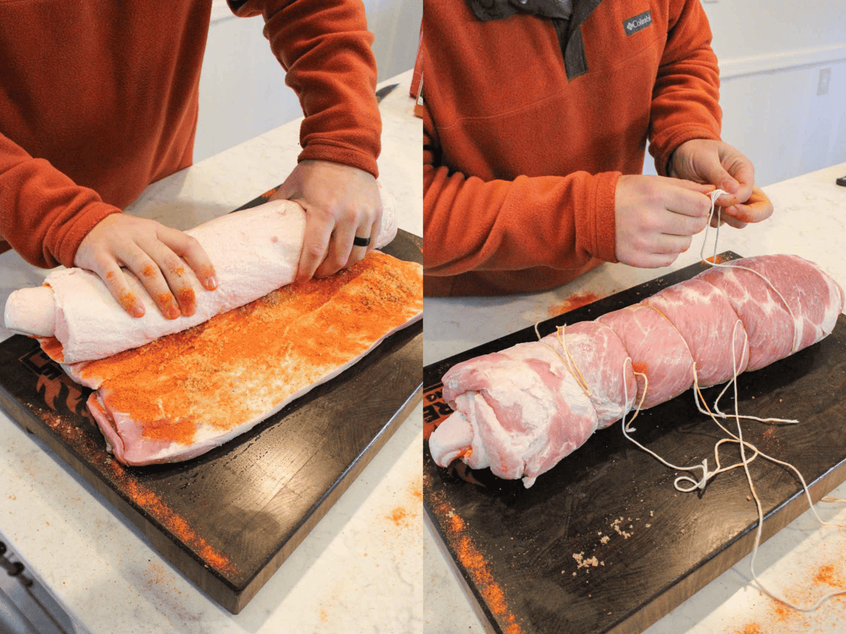 Rolling the pork belly up and securing it with butcher's twine.