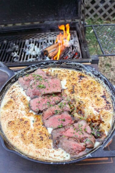 Smoked Steak Queso Dip cooked Over the Fire.