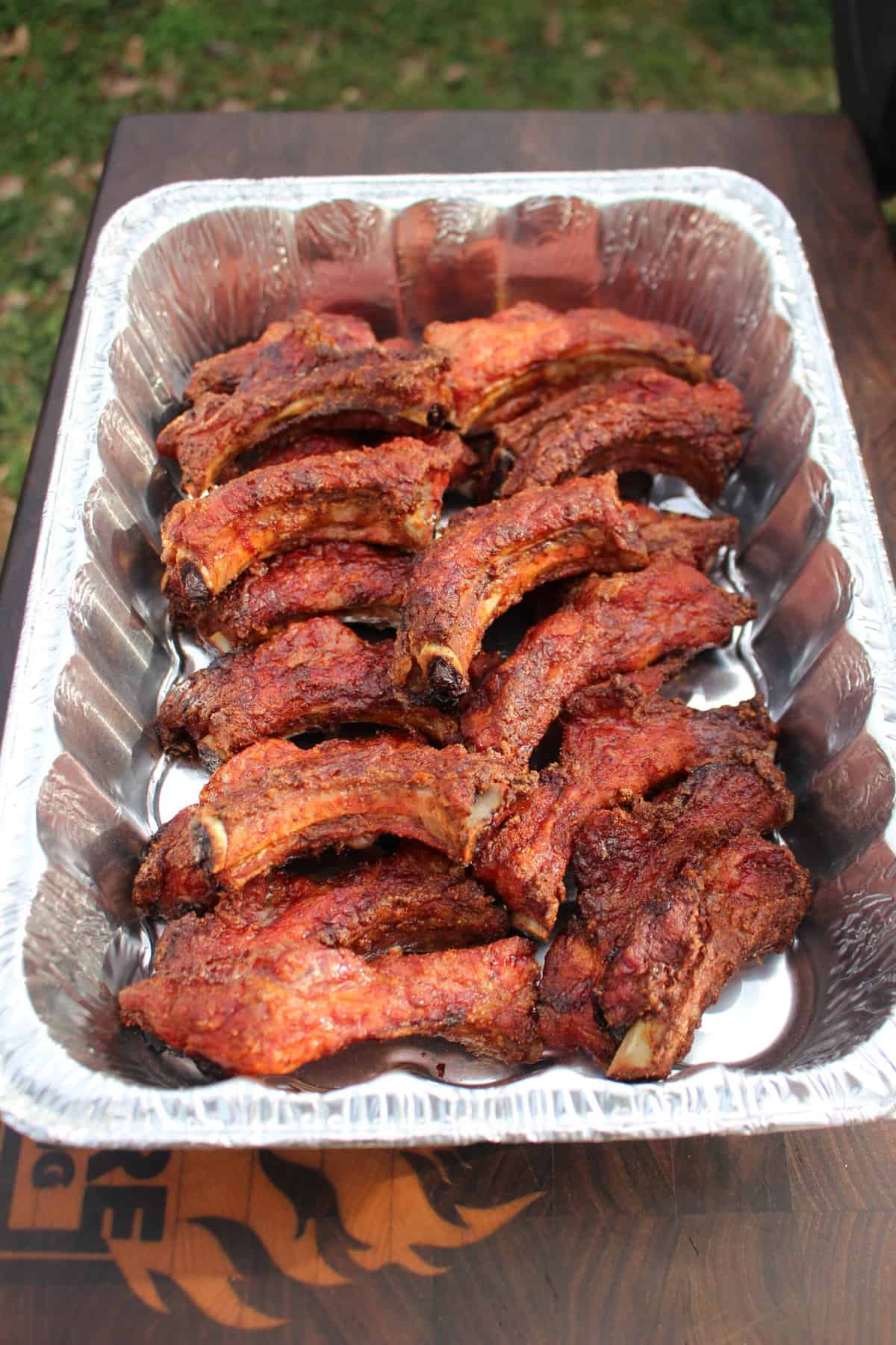 Smoked party ribs after the initial cooking stage.