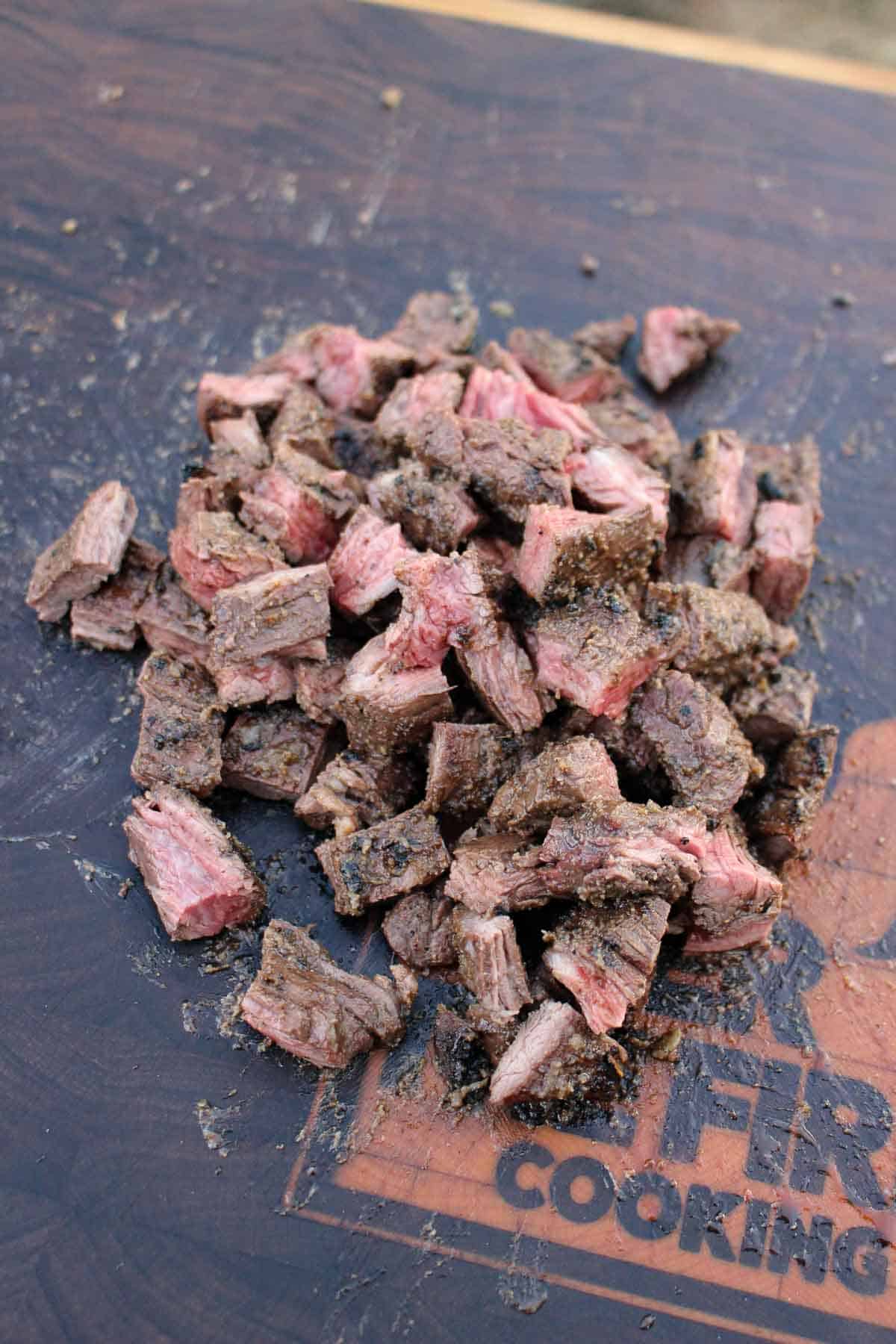 The tender skirt steak is chopped into tasty cubes.  