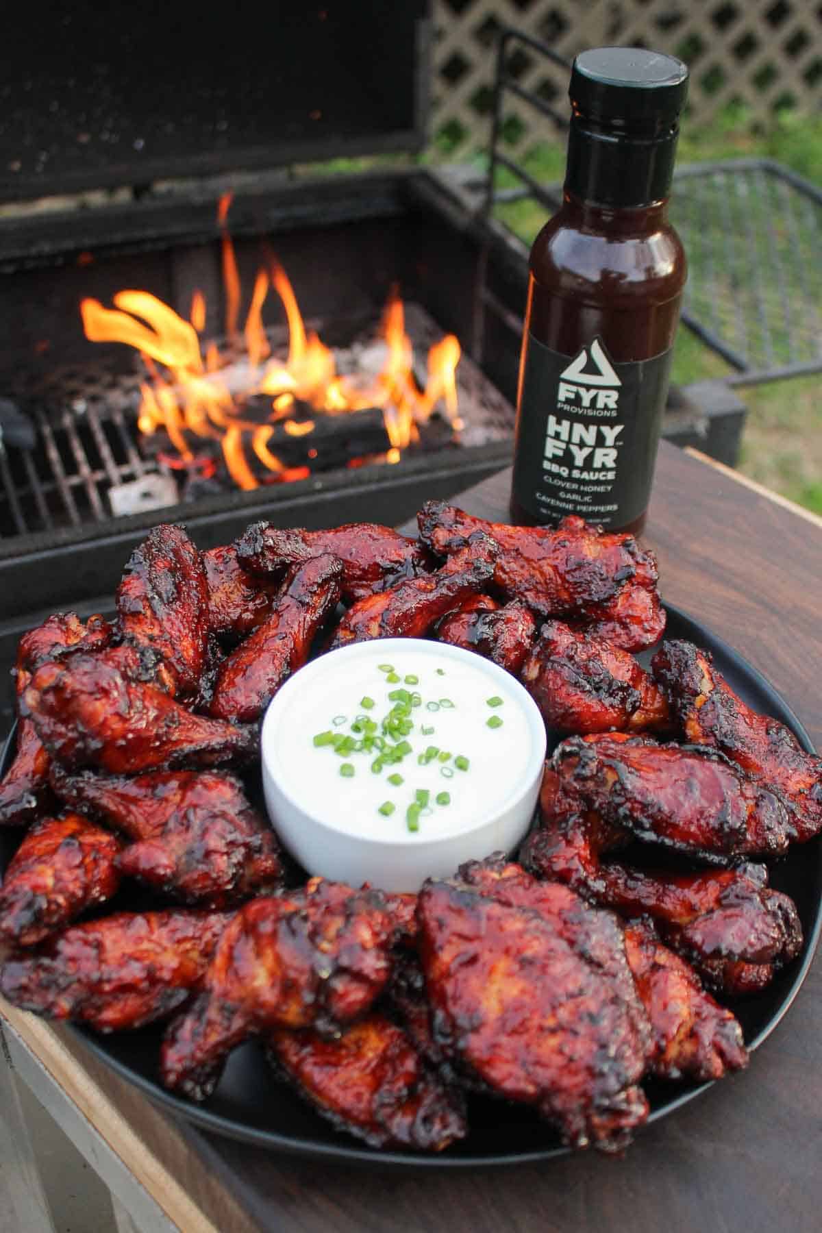 HNY FYR BBQ Wings on a party platter with some homemade blue cheese dipping sauce. 