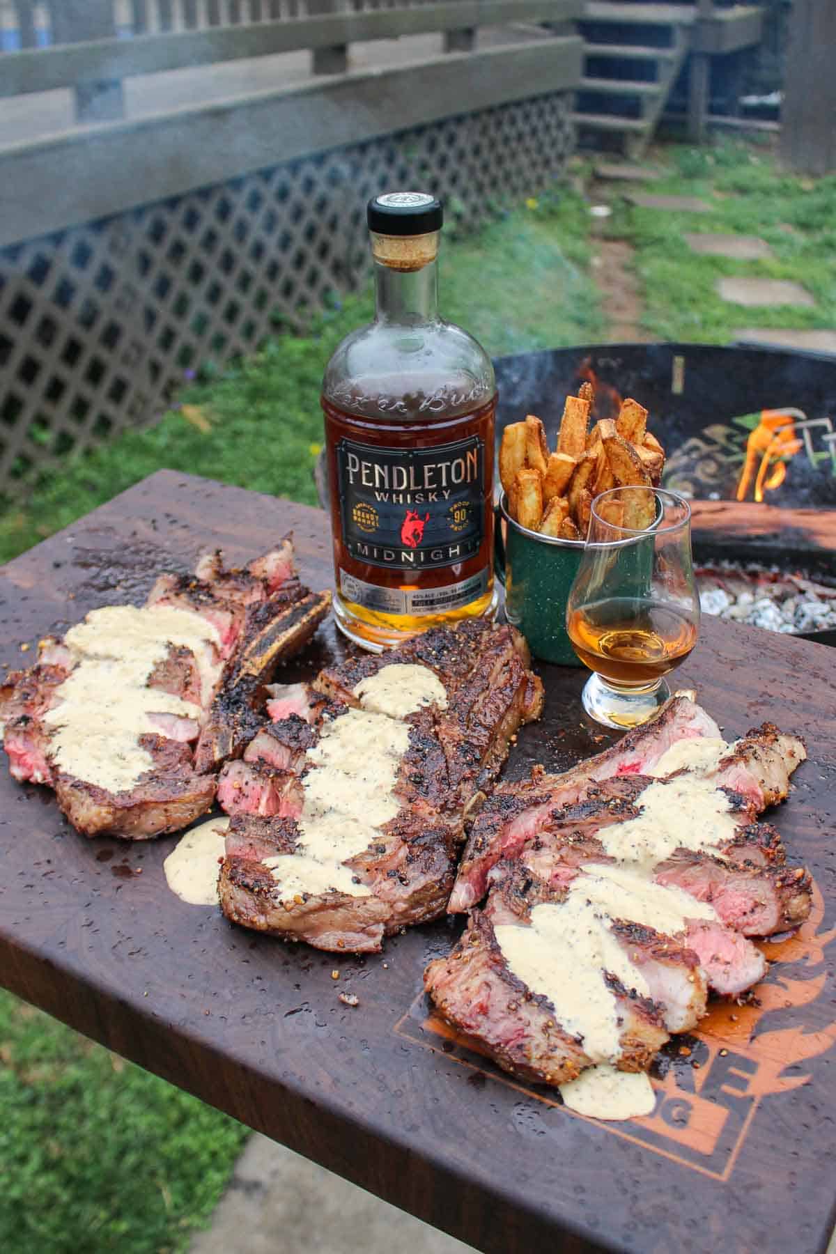 Steak with Peppercorn Cream Sauce and Pendleton Midnight Whisky served up.