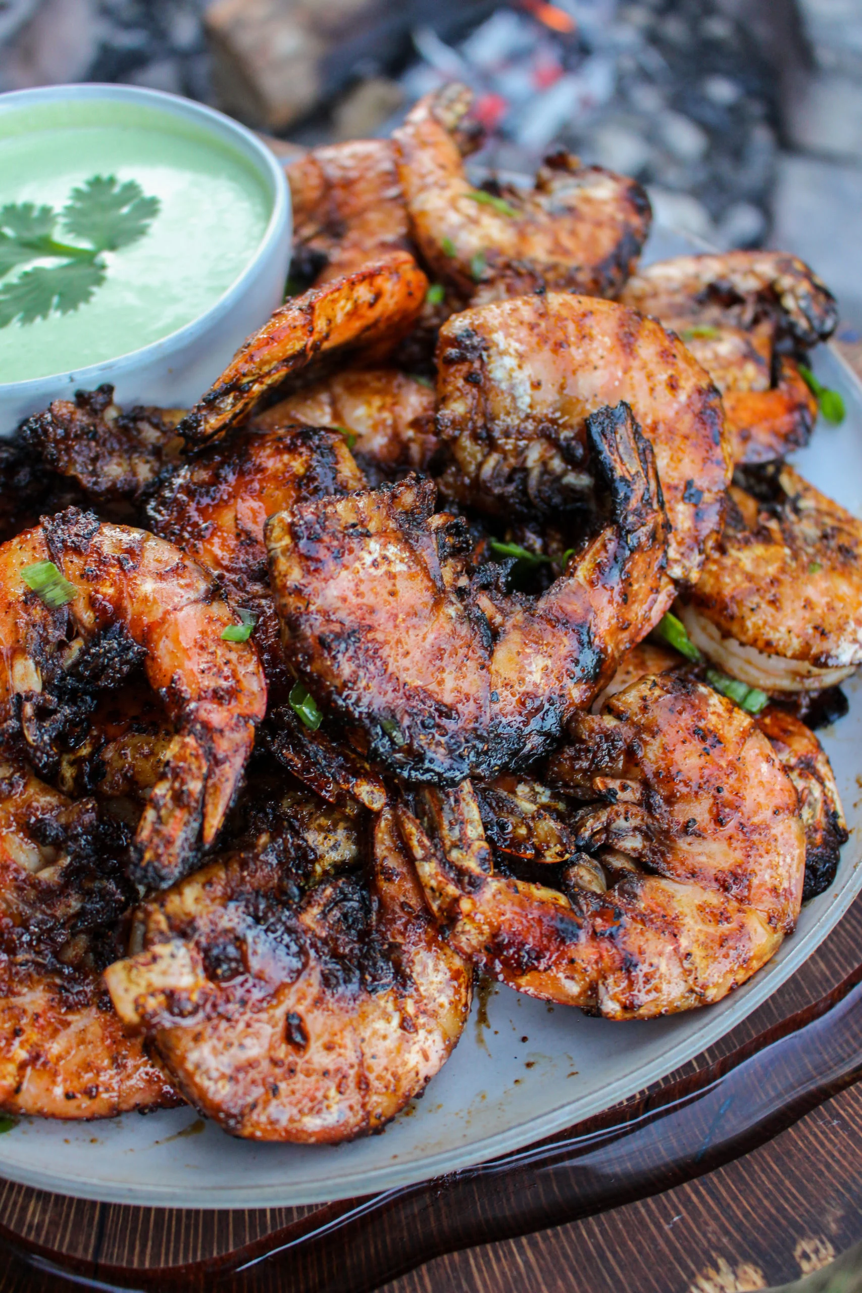 Grilled shrimp piled on a plate and ready to serve.