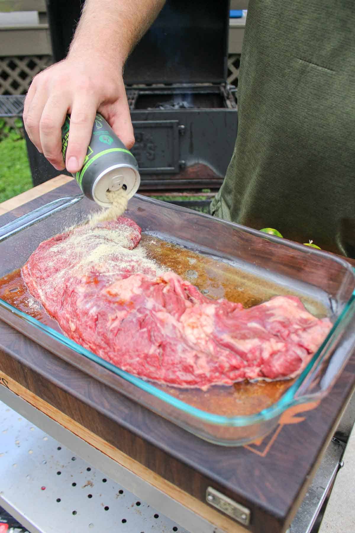 The flap steak is seasoned. 