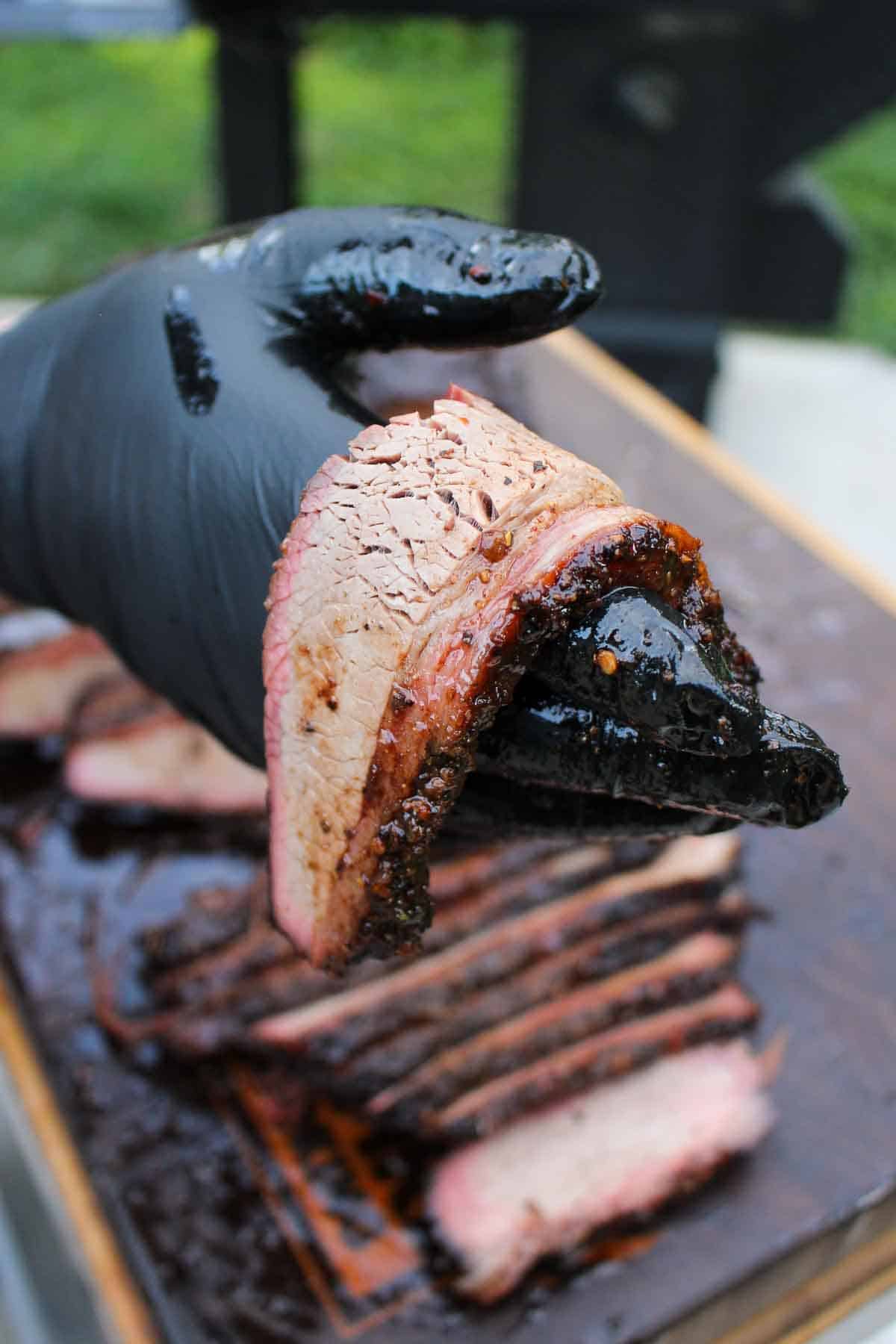 The brisket is tender with a crisp bark. 