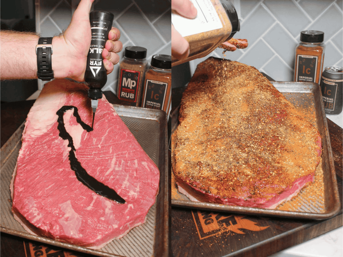 Seasoning the brisket with BLK FYR Hot sauce and two spiceology seasonings. 