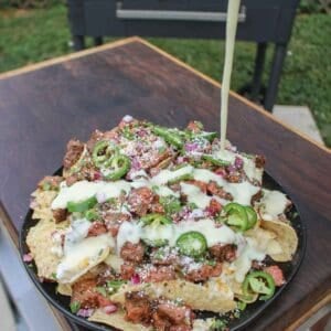 Steak Elote Nachos are served.