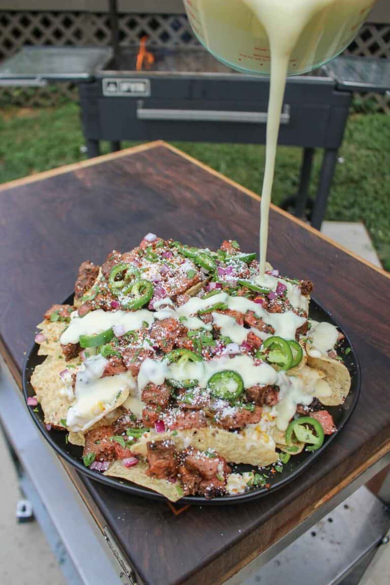 Steak Elote Nachos are served.