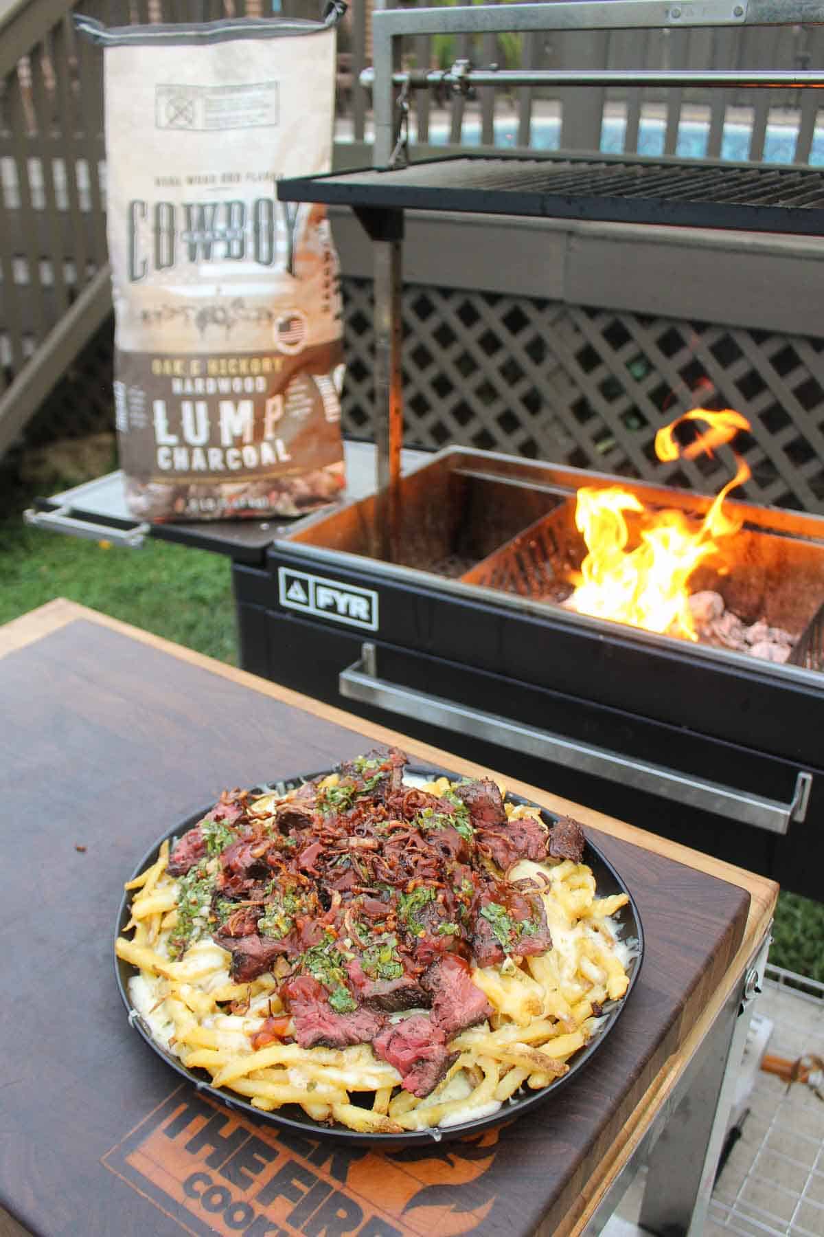 Cheese fries with chimichurri steak and Cowboy Charcoal