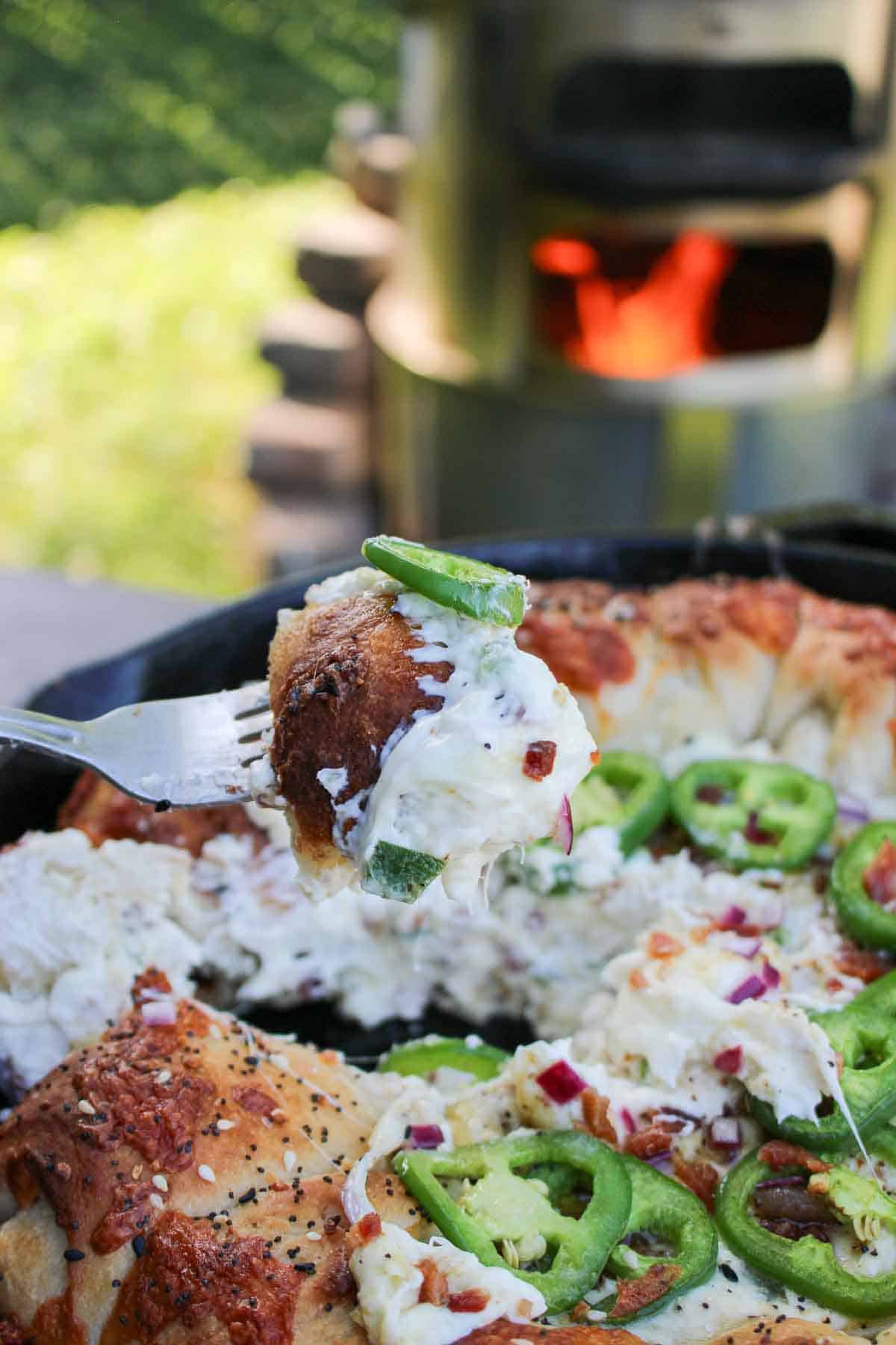 A close up shot of a jalapeno popper dip bite!