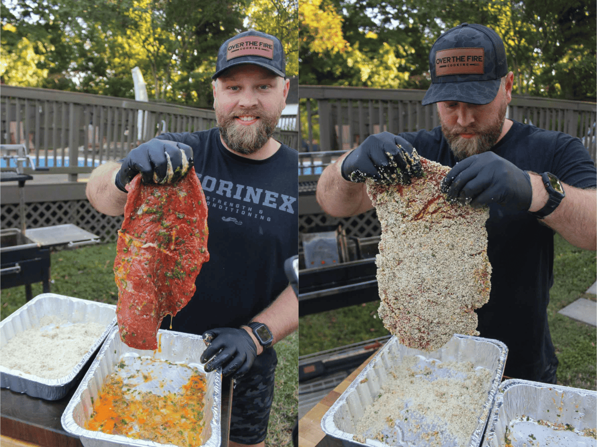 A man holding up slices of top sirloin, dipping them in egg wash and then in a breadcrumb mixture