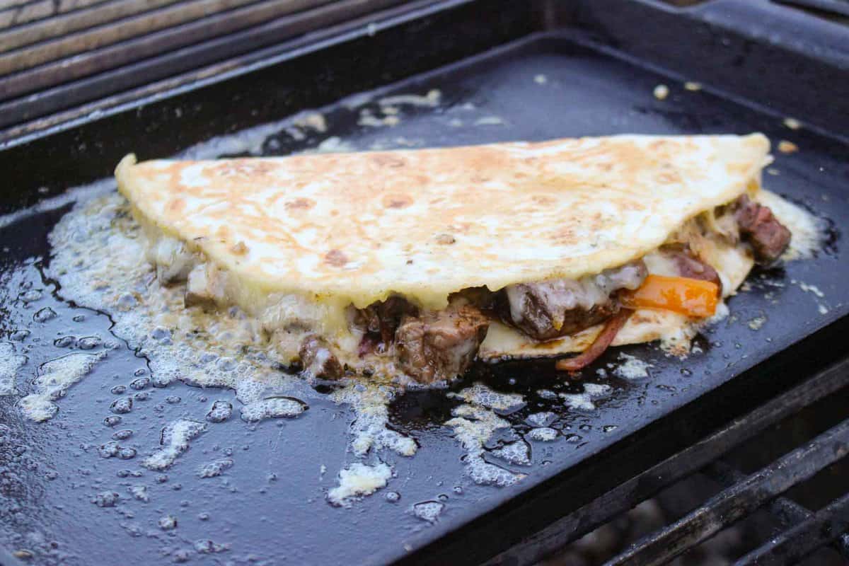 The Steak Fajita Quesadilla is fully assembled and finished off on the grill.