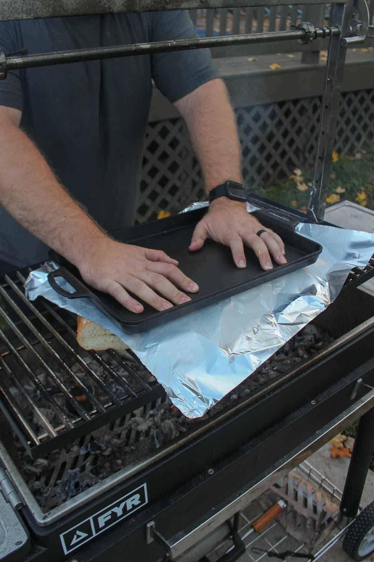 The sandwiches are pressed over the grill for that perfect toasty bite.