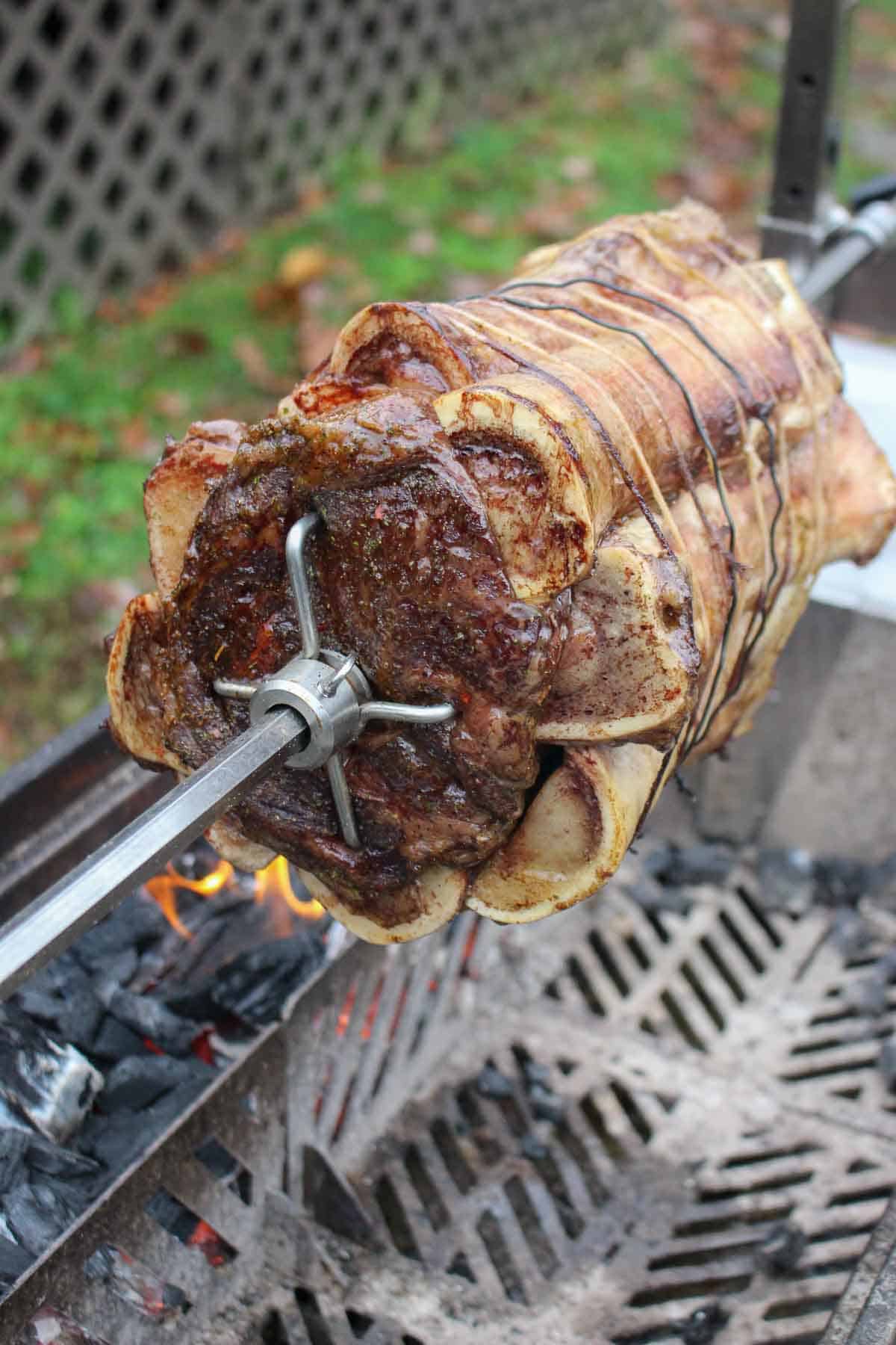 The prime rib turns a dark beautiful brown after roasting over the fire.