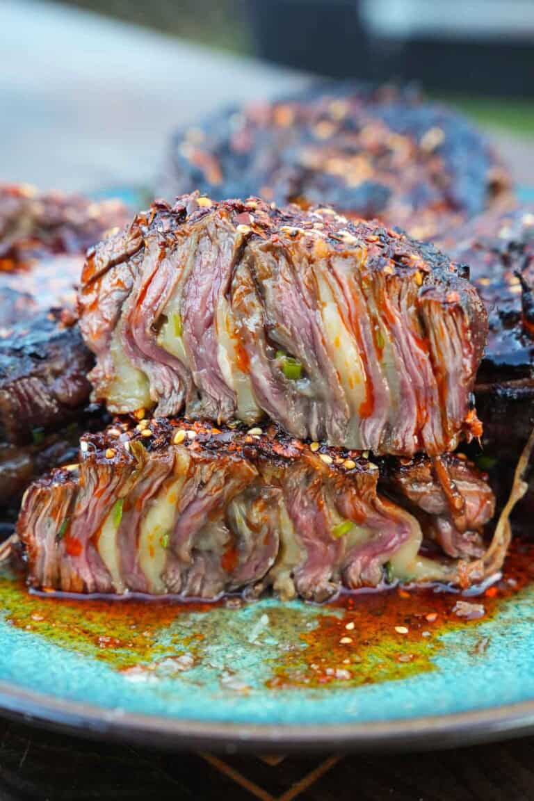 A chili oil steak pinwheel sliced open to reveal the inside