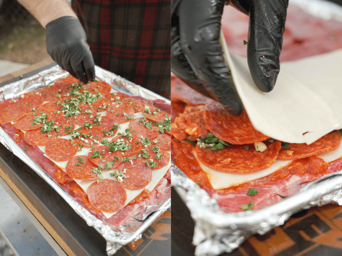 Layering pepperoni, sausage, mozzarella, parsley and garlic on top of sirloin steak