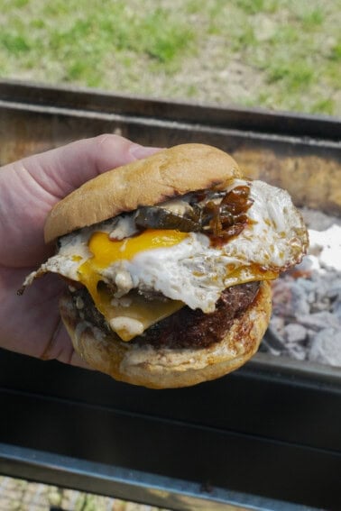 The burger is built and ready for the first bite. A total flavor bomb for your taste buds awaits.