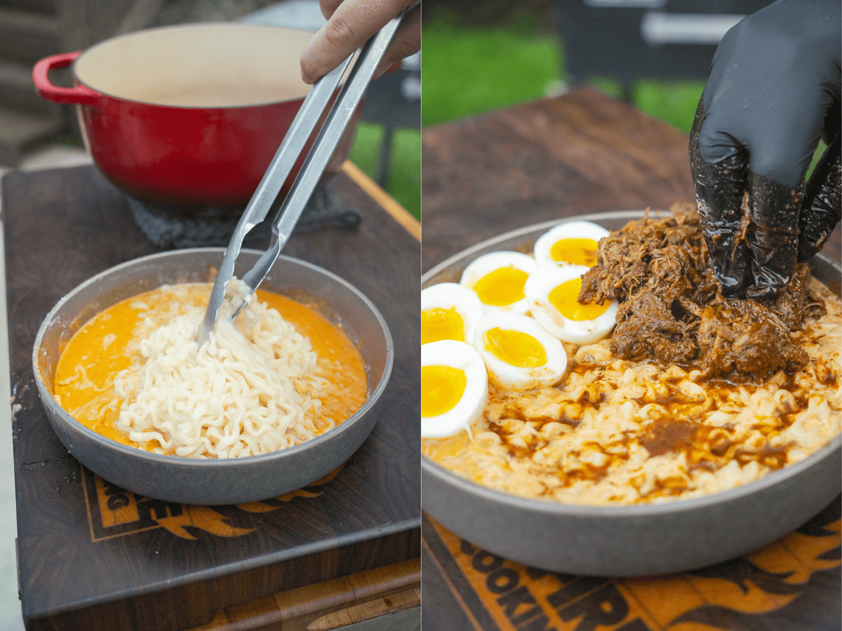 Assembling the birria ramen using tongs and garnishing with soft boiled eggs