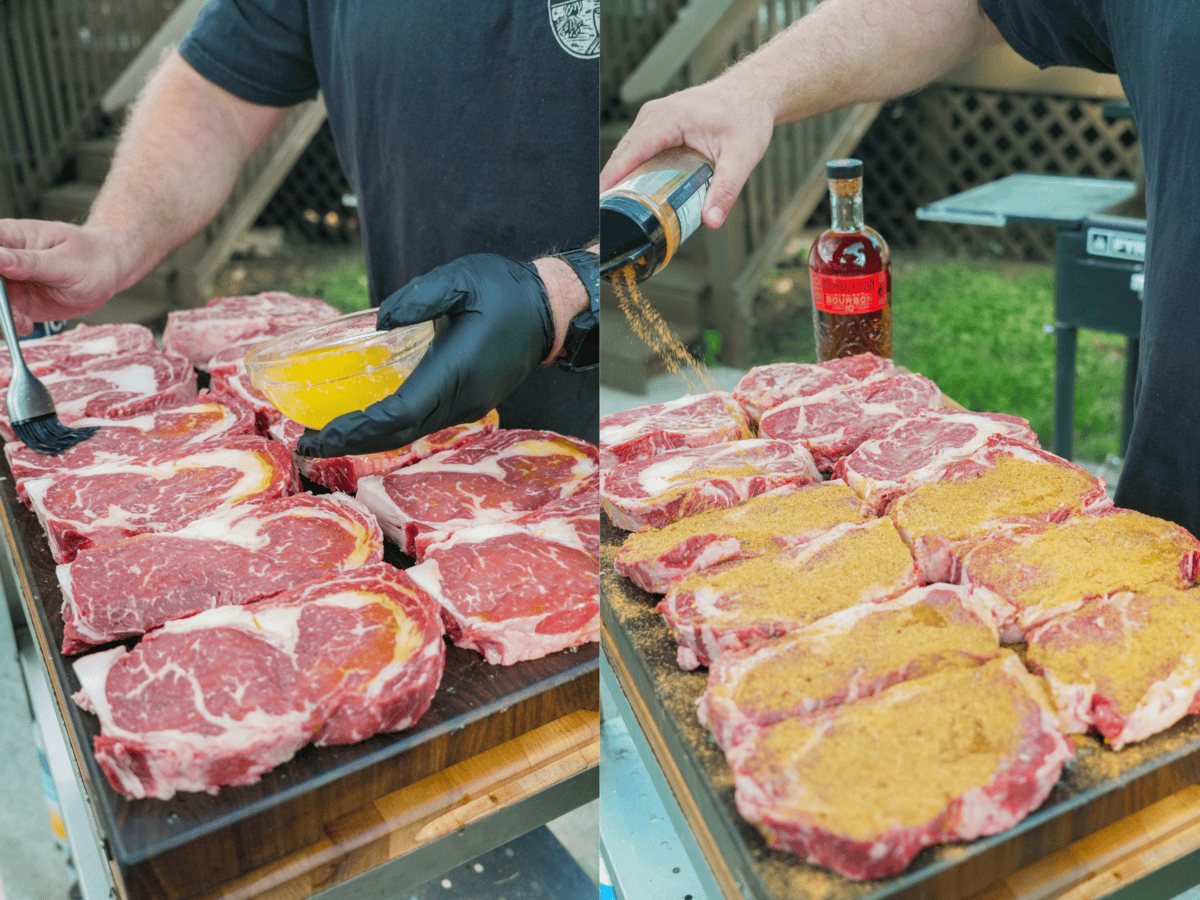Seasoning steaks with Cowboy Butter Rub for grilling